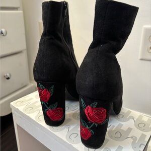 Black booties with rose detail